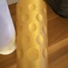 Dubbe Spardose Gold von liegend auf der Seite